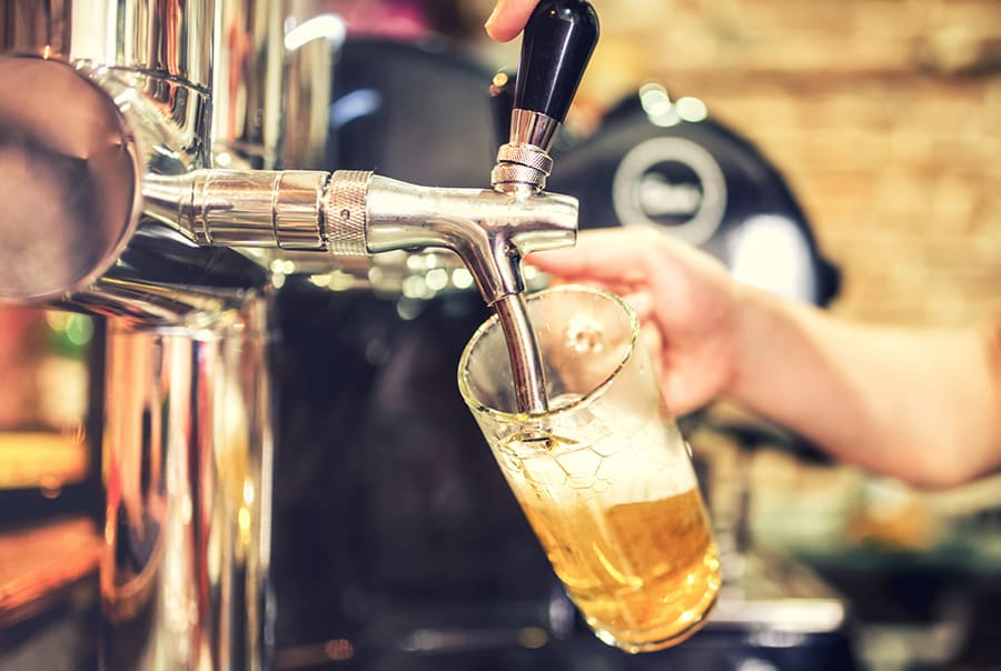 Pint of beer being poured