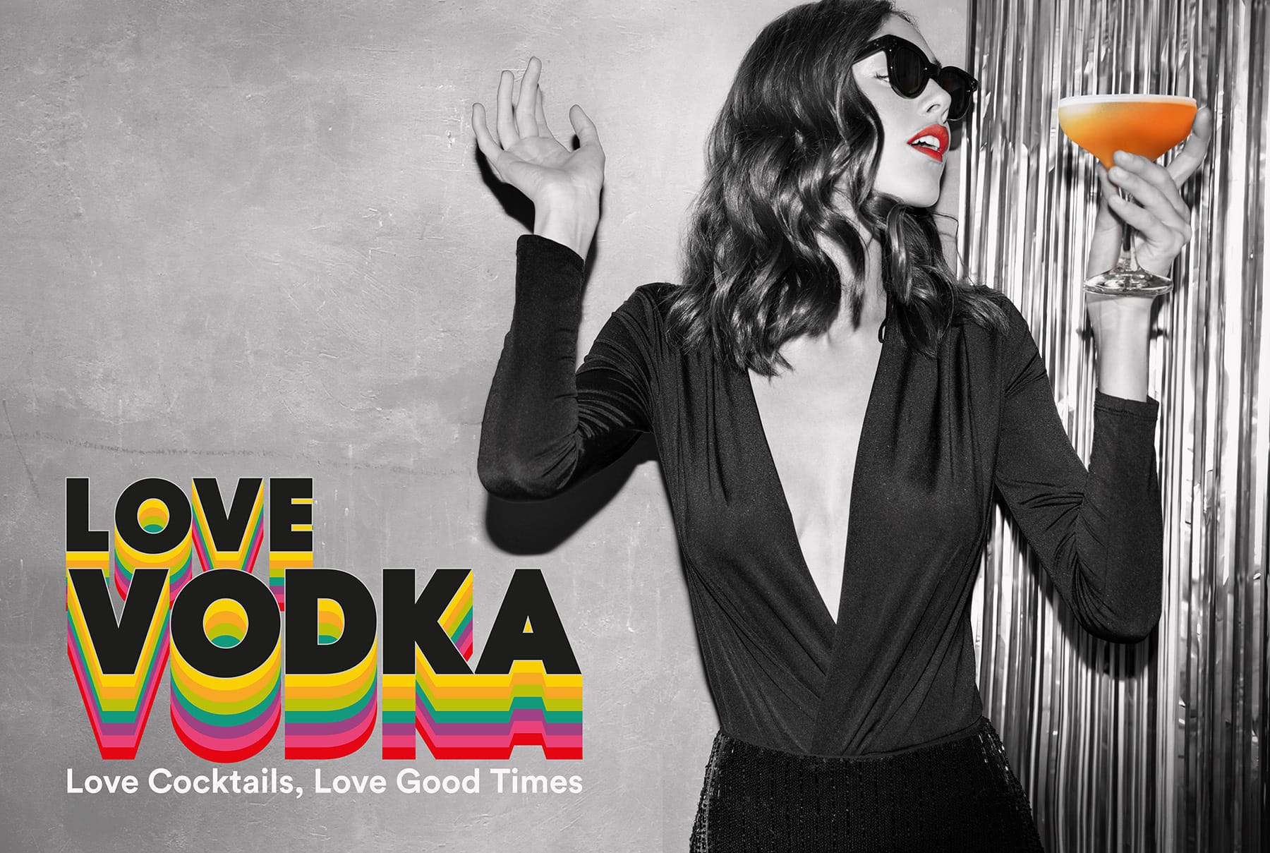 love vodka logo with lady drinking cocktail