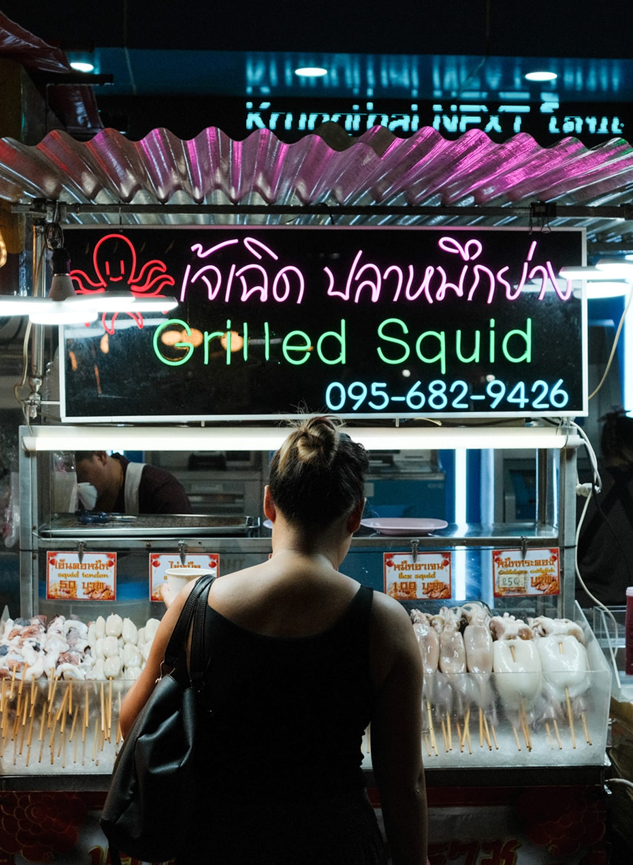 Grilled squid stall in Thailand